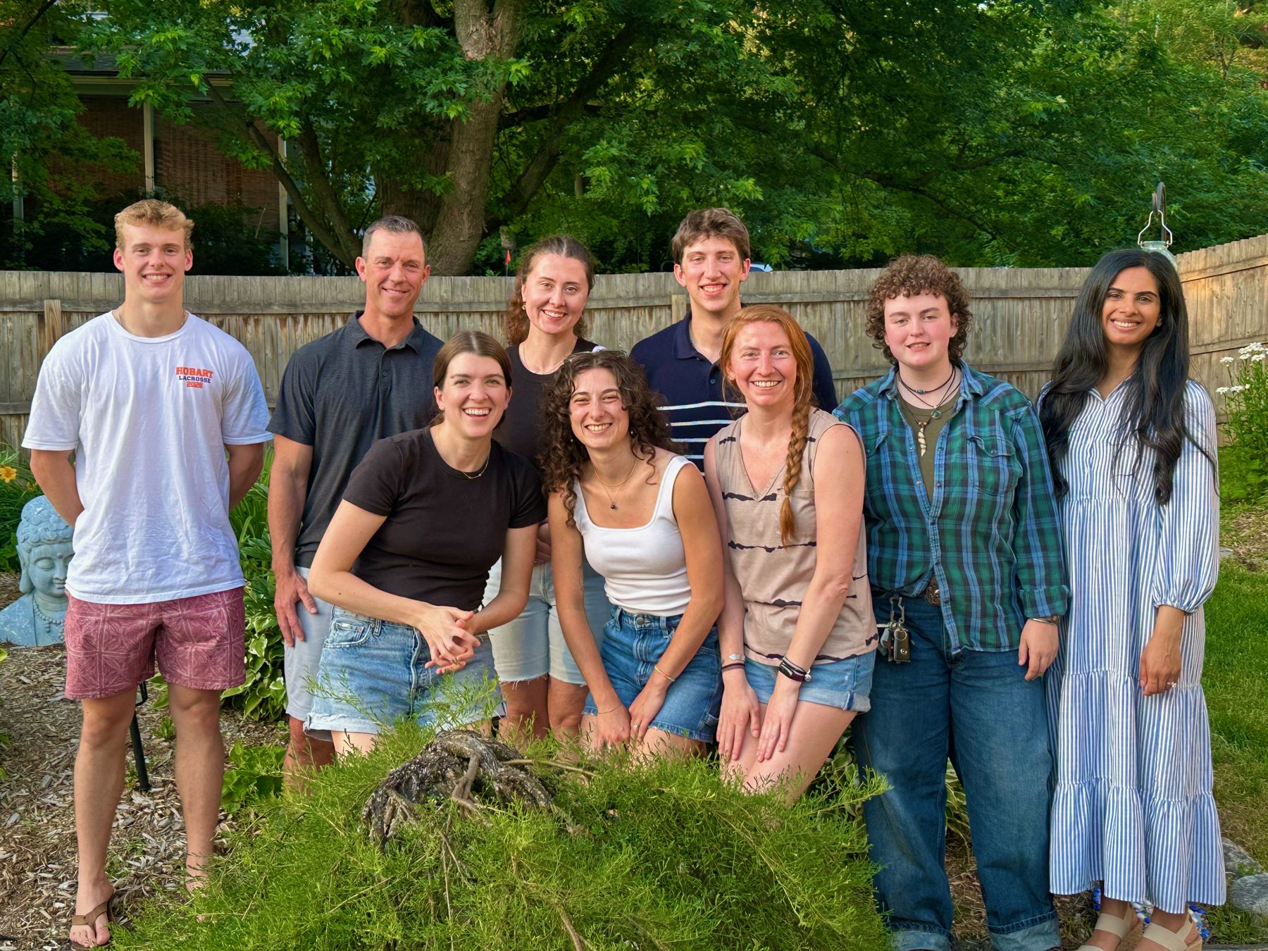 Stumpff lab members standing together outdoors in summer